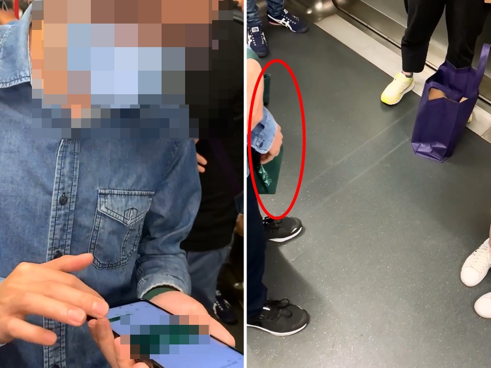 Man secretly filming woman on MTR caught in the act. Photo from fb group hk incident. Man secretly filming woman on MTR caught in the act. Photo from fb group hk incident.