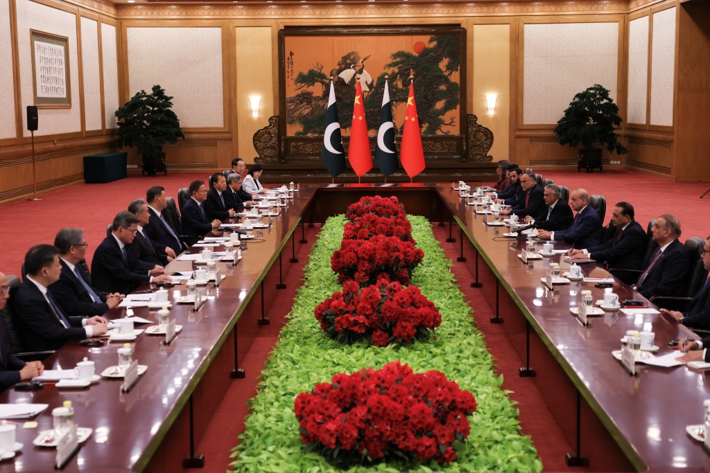 Chinese President Xi Jinping and Pakistan's Prime Minister Shehbaz Sharif attend a meeting at the Great Hall of the People, in Beijing, China May 25, 2026.  (Reuters)