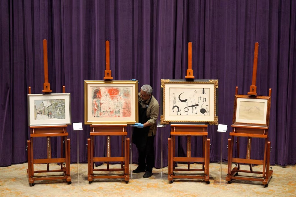 Artworks by Maurice Utrillo, titled Rue Saint-Rustique a Montmartre (1934), Pablo Picasso, titled L'Ecuyere et les clowns (1961), Joan Miro, titled Composition (1953) and Balthus, titled Etude pour femme couchee (1948) are displayed by the Malaysian Anti-Corruption Commission during a news conference, where the anti-graft agency vowed to recover more high-value artworks linked to the multibillion-dollar 1MDB scandal at Putrajaya, Malaysia, May 6, 2026. REUTERS/Najjua Zulkefli 