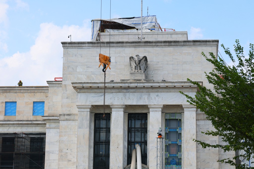 WASHINGTON, DC - JULY 17: The Federal Reserve building is seen as it goes under construction on July 17, 2025 in Washington, DC. U.S. President Donald Trump, who has been pressuring Federal Reserve chairman Jerome Powell to cut interest rates, says that he is "highly unlikely" to fire him. Office of Management and Budget director Russell Vought has asked the Powell to respond to a series of questions about cost overruns in the nearly $2.5 billion renovation by July 21st. Michael M. Santiago/Getty Images/AFP