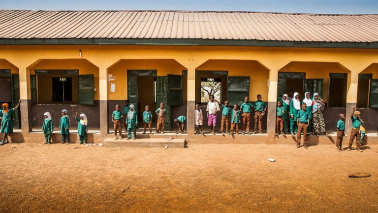 A group of children are seen standing outside their classrooms at a school in Northern Ghana. (Xinhua via CGTN) A group of children are seen standing outside their classrooms at a school in Northern Ghana. (Xinhua via CGTN)