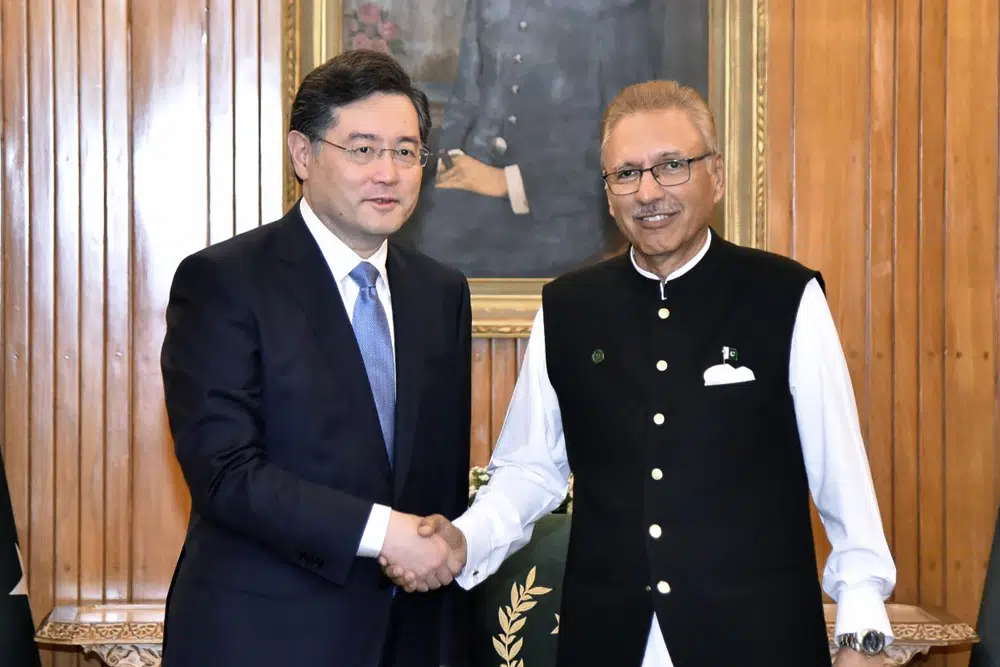 In this photo released by Pakistan's President office, visiting Chinese Foreign Minister Qin Gang, left, shakes hand with Pakistani President Arif Alvi prior to their meeting, in Islamabad, Pakistan, Friday, May 5, 2023. (AP) In this photo released by Pakistan's President office, visiting Chinese Foreign Minister Qin Gang, left, shakes hand with Pakistani President Arif Alvi prior to their meeting, in Islamabad, Pakistan, Friday, May 5, 2023. (AP)