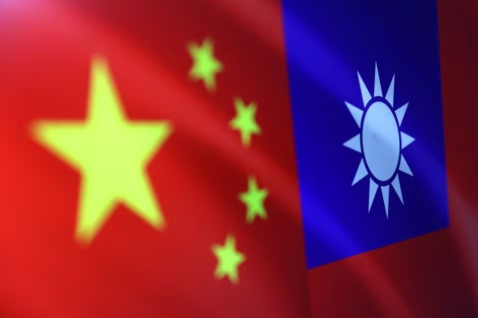 Chinese and Taiwanese flags are seen in this illustration, August 6, 2022. REUTERS/Dado Ruvic/Illustration/File Photo Chinese and Taiwanese flags are seen in this illustration, August 6, 2022. REUTERS/Dado Ruvic/Illustration/File Photo