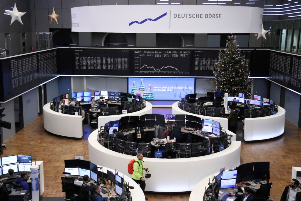 The German stock exchange is decorated for the Christmas season as the German share price index DAX graph is pictured in Frankfurt, Germany, December 19, 2024.    REUTERS