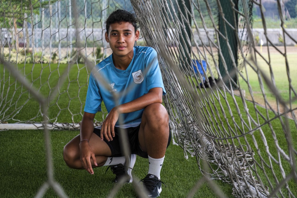 Photo by BAY ISMOYO / AFP This picture taken on September 29, 2026 shows Garudayaksa FC's Nastasia Suci Ramadhani posing for a photograph during a football training session in Bekasi, West Java province.