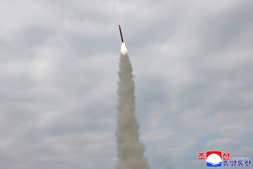 This picture taken on October 28, 2025 and released by North Korea's official Korean Central News Agency (KCNA) on October 29, 2025 shows a test launch of a sea-to-surface strategic cruise missile conducted by the North Korean Missile General Administration at an unconfirmed location in North Korea. (Photo by KCNA VIA KNS / AFP)