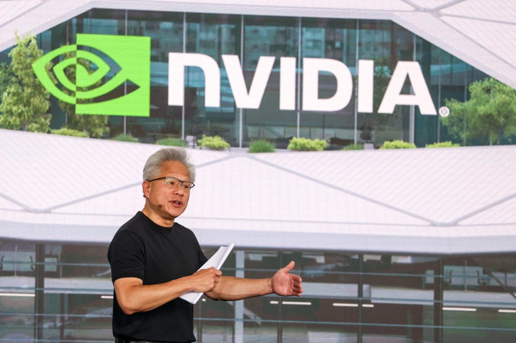 Nvidia CEO Jensen Huang speaks at the company-wide convention at their T17 and T18 plots in Shilin-Beitou Technology Park in Taipei on May 27, 2026. (Photo by I-Hwa Cheng / AFP)