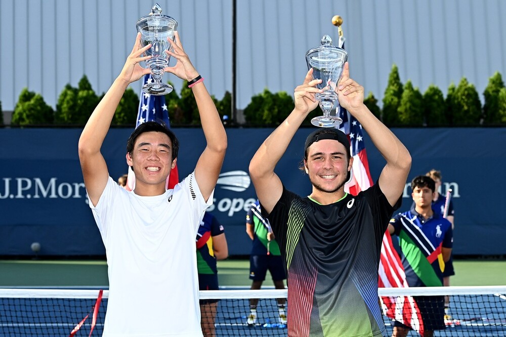 Coleman Wong celebrates with partner Max Westphal after winning the US Open Boys' Doubles title in New York. Above, with his father. Coleman Wong celebrates with partner Max Westphal after winning the US Open Boys' Doubles title in New York. Above, with his father.