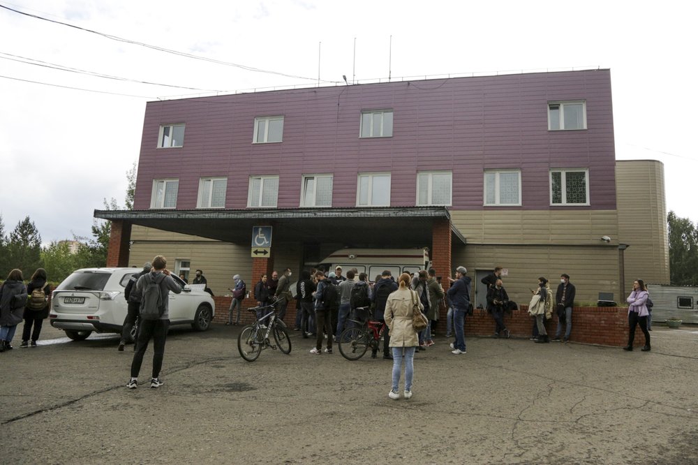 Journalists gather at the Omsk Ambulance Hospital No. 1, intensive care unit where Alexei Navalny was hospitalized in Omsk, Russia, Friday.
