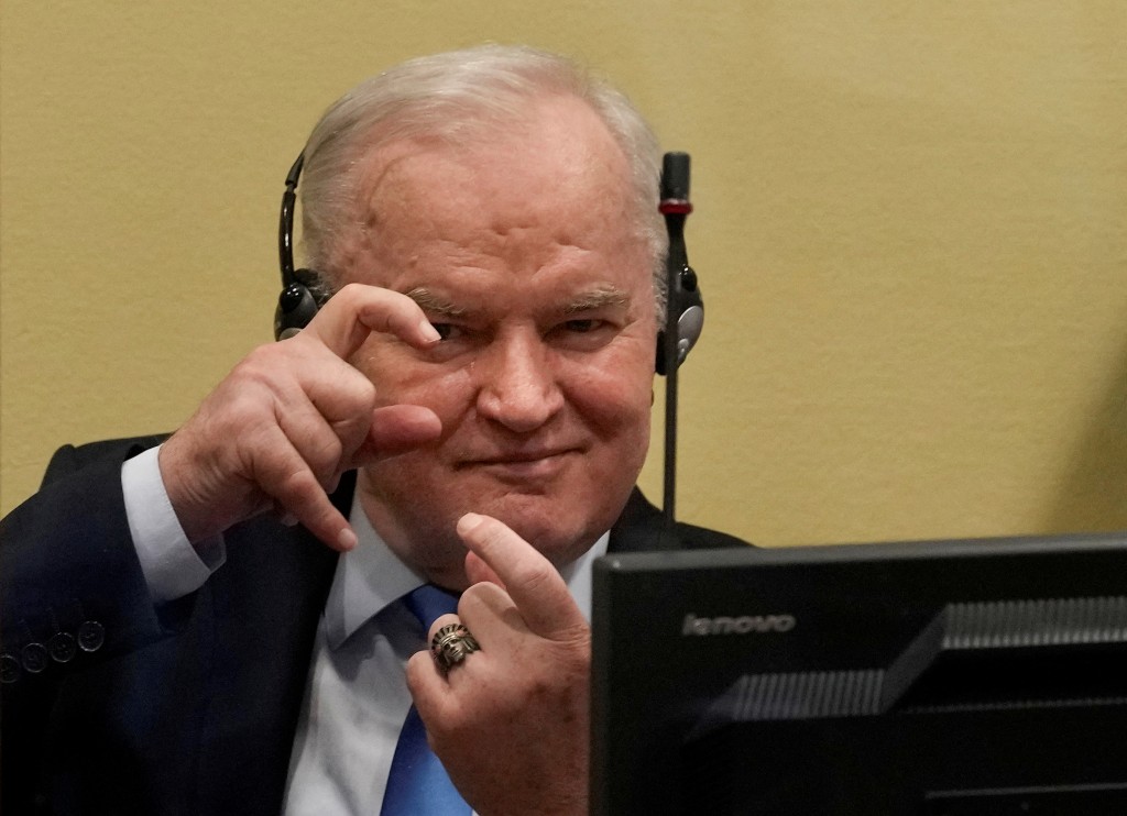 Former Bosnian Serb military leader Ratko Mladic gestures prior to the pronouncement of his appeal judgement at the UN International Residual Mechanism for Criminal Tribunals (IRMCT) in The Hague, Netherlands June 8, 2021 (Reuters)