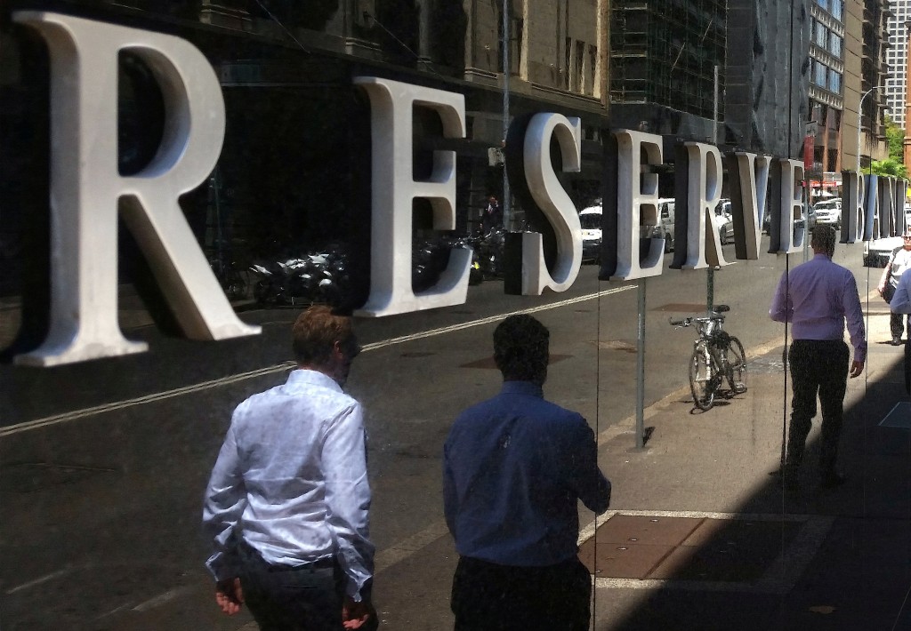 Pedestrians walk past the Reserve Bank of Australia building in central Sydney, Australia, February 10, 2017. REUTERS