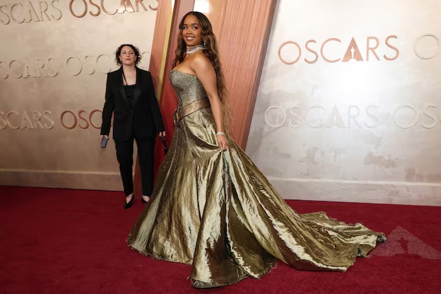 H.E.R. poses on the red carpet during the Oscars arrivals at the 97th Academy Awards in Hollywood, Los Angeles, California, U.S., March 2, 2025. REUTERS/Mario Anzuoni/File Photo