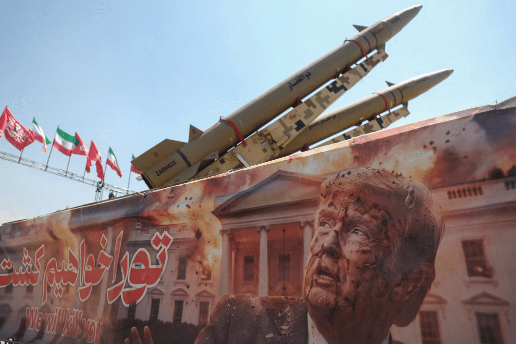 A banner with a picture of U.S. President Donald Trump next to an Iranian missile system at Azadi Square in Tehran, Iran, July 30, 2026. Majid Asgaripour/WANA (West Asia News Agency) via REUTERS