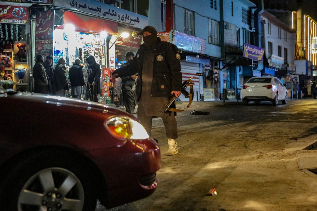 Photo by - / AFP  Taliban security personnel stand guard at a blast site following an explosion in the Shahr-e Naw area of Kabul on January 19, 2026.