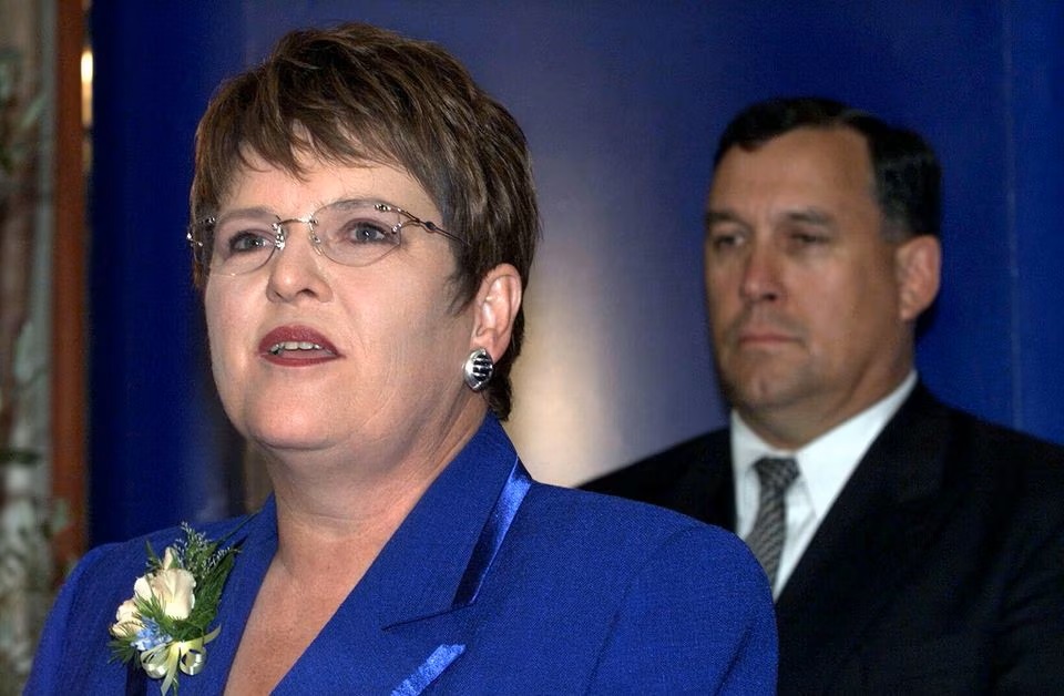 Former New Zealand Prime Minister Jenny Shipley addresses party supporters as husband Burton looks on after conceding victory to the Labour Party leader Helen Clark in Methven. (Reuters) Former New Zealand Prime Minister Jenny Shipley addresses party supporters as husband Burton looks on after conceding victory to the Labour Party leader Helen Clark in Methven. (Reuters)