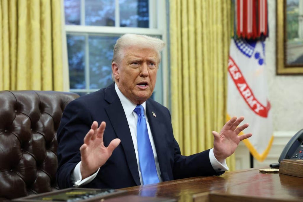 U.S. President Donald Trump speaks in the Oval Office of the White House in Washington, D.C., U.S., February 11, 2025. REUTERS/Kevin Lamarque 