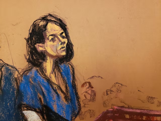Jeffrey Epstein associate Ghislaine Maxwell stands at the podium to address Judge Alison Nathan during her sentencing in a courtroom sketch in New York City, U.S. June 28, 2022. Maxwell was convicted on December 29, 2021 on five of the six counts she faced for helping the late financier and convicted sex offender Jeffrey Epstein sexually abuse underage girls. REUTERS/Jane Rosenberg/File Photo 