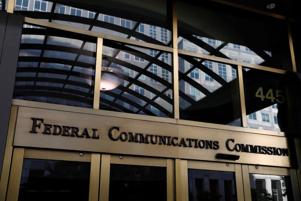 Signage is seen at the headquarters of the Federal Communications Commission in Washington, D.C., U.S., August 29, 2020. REUTERS