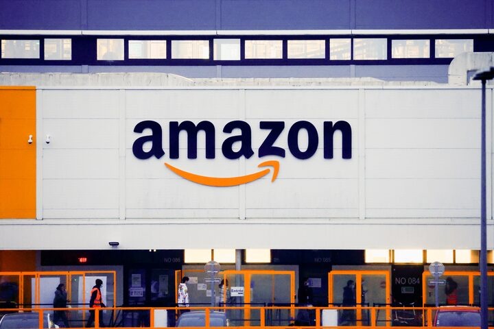 The logo of Amazon is seen at the company's logistics center in Bretigny-sur-Orge, near Paris, France, December 7, 2021. REUTERS/Gonzalo Fuentes/File Photo