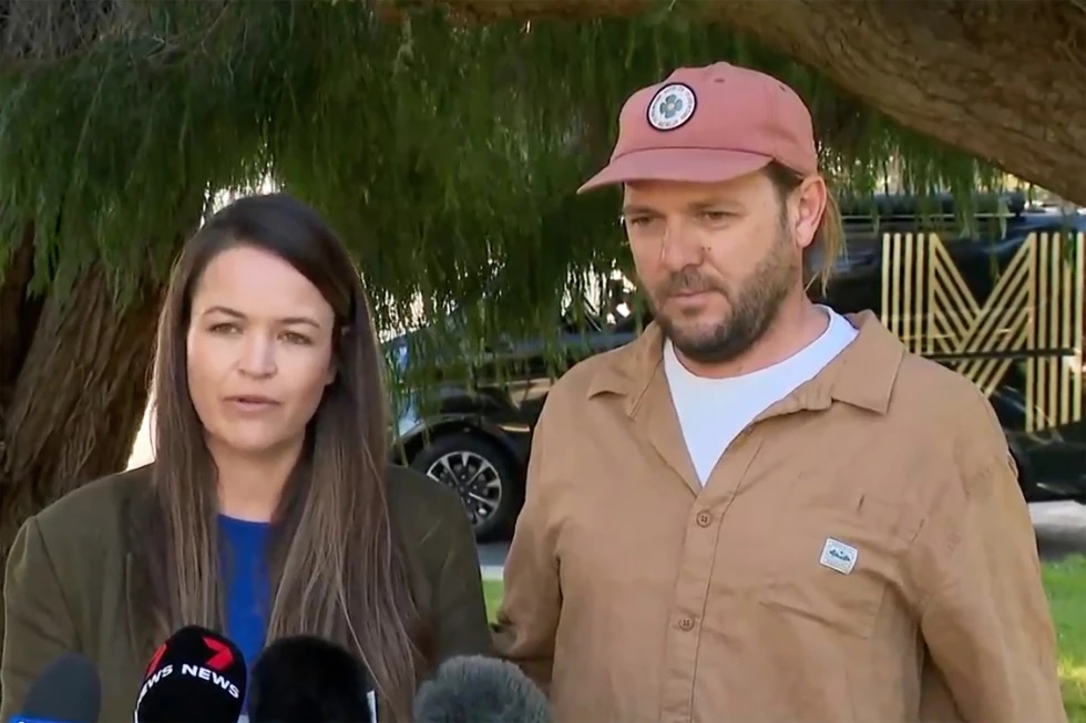 In this image made from video provided by CH7 AUS, Samantha Moran, left, stands next to her husband Tobias, while speaking to media in Perth, Australia, on June 14, 2023. (CH7 AUS via AP, File)