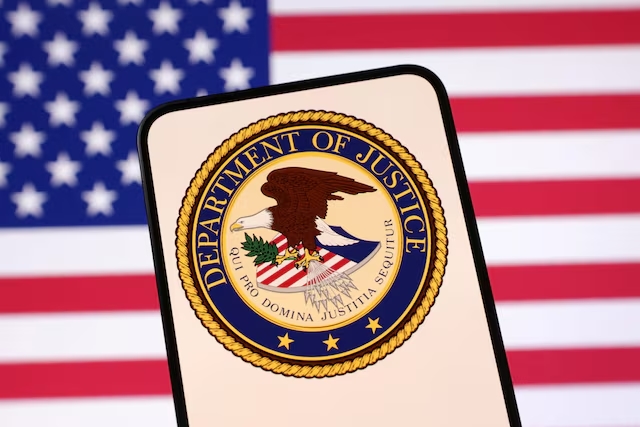 United States Department of Justice logo and U.S. flag are seen in this illustration taken April 23, 2025. (Reuters)