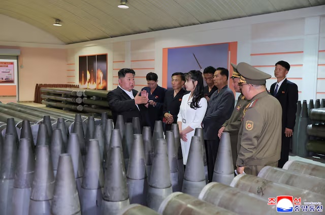 North Korean leader Kim Jong Un speaks while he inspects military factories, as he urges ramp-up in shell production to meet modern warfare demands, at an unknown location in North Korea, June 13, 2025. KCNA via REUTERS/File Photo
