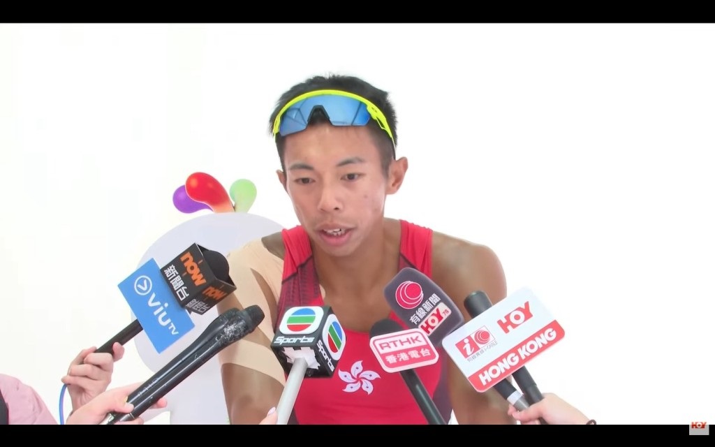 Hong Kong’s rowing representatives Chiu Hin-chun speaking to the press after finishing fifth in his lightweight single sculls finals at the 15th National Games.