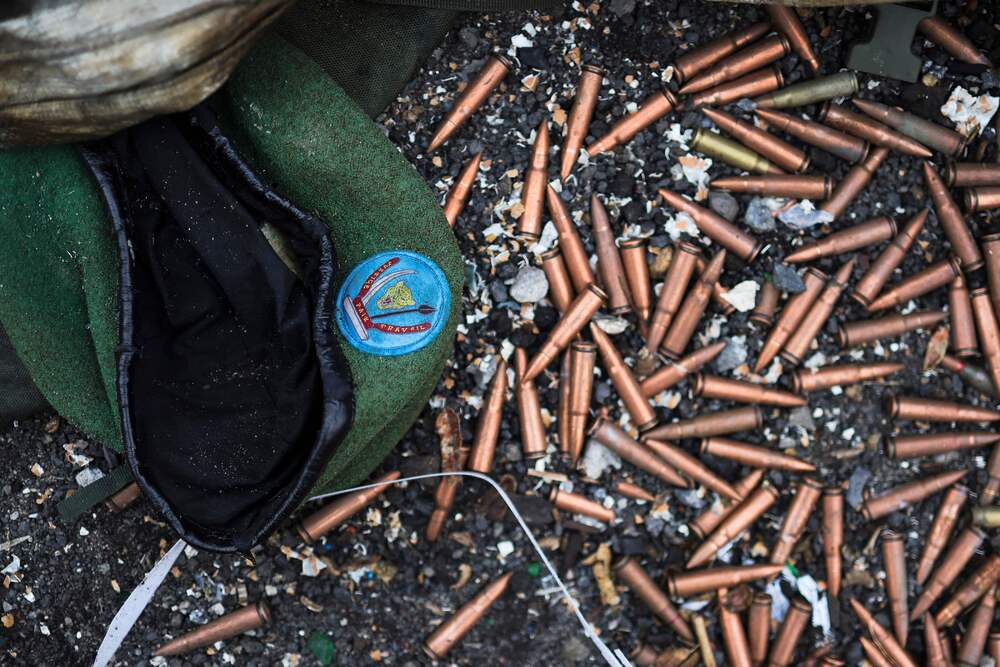 A military beret bearing the Armed Forces of the Democratic Republic of Congo (FARDC) insignia lies discarded alongside a pile of unspent cartridges near an abandoned, bullet-riddled military truck in Goma on January 31, 2025. (AFP) A military beret bearing the Armed Forces of the Democratic Republic of Congo (FARDC) insignia lies discarded alongside a pile of unspent cartridges near an abandoned, bullet-riddled military truck in Goma on January 31, 2025. (AFP)