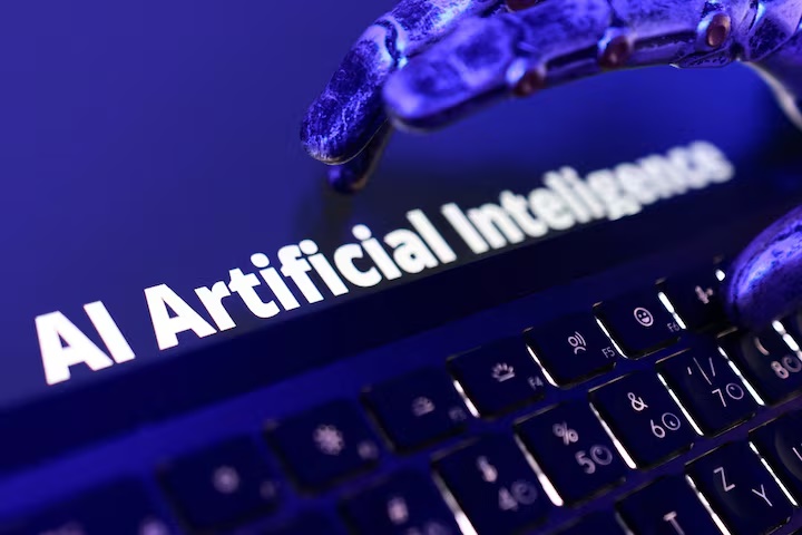 Words "AI Artificial Inteligence", keyboard, and a robotic hand in this illustration taken June 5, 2026. REUTERS/Dado Ruvic/Illustration/File Photo 