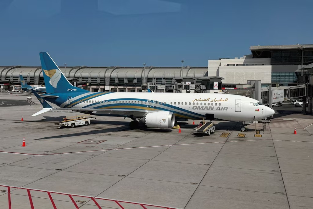 A Boeing 737 MAX 8 operated by Oman Air, on the tarmac at Muscat International Airport, amid the U.S.-Israeli conflict with Iran, in Muscat, Oman, March 13, 2026. REUTERS/Benoit Tessier/File Photo