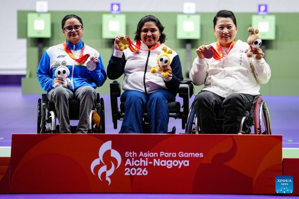 Gold medalist Mona Agarwal (C) of India, silver medalist Avani Lekhara (L) of India, and bronze medalist Lee Yunri of South Korea pose for photos during the awarding ceremony for para shooting R2 Women's 10m air rifle standing SH1 at the Aichi-Nagoya Asian Para Games in Toyota of Aichi Prefecture, Japan, Oct. 19, 2026. (Xinhua/Jia Haocheng)