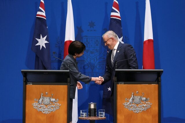 Japan's Prime Minister Sanae Takaichi shakes hands with Australia's Prime Minister Anthony Albanese during a press conference at Parliament House in Canberra, Australia, May 4, 2026. REUTERS/Hollie Adams