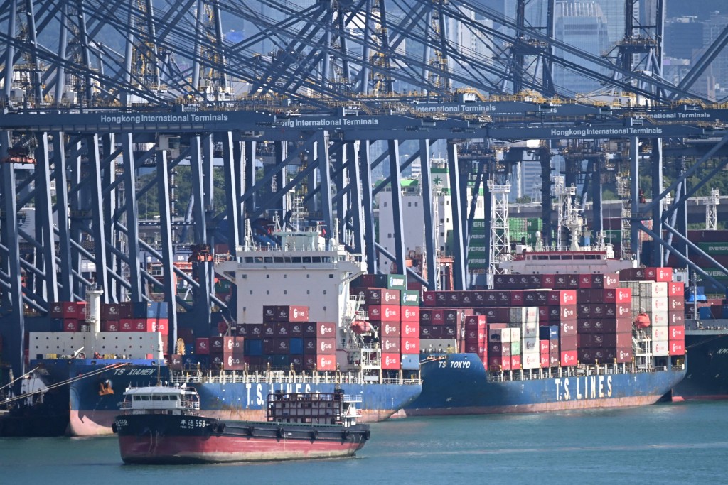 Cargo ships are seen at the Kwai Chung container terminal in Hong Kong on October 13, 2025. (Photo by Peter PARKS / AFP)