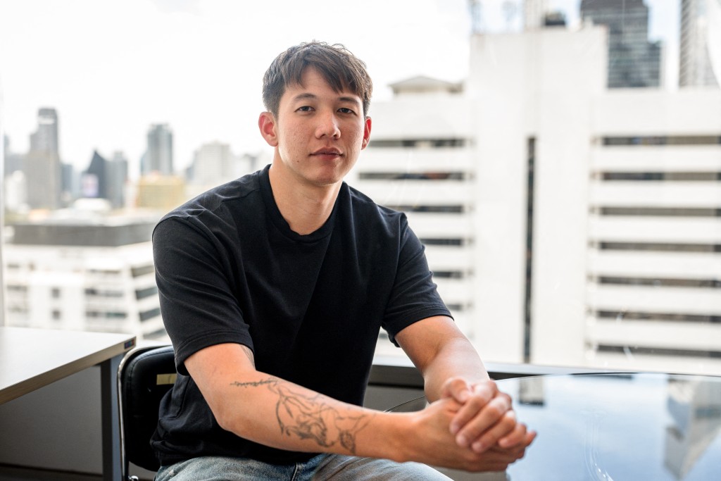 Siranudh "Psi" Scott, a fourth-generation member of the billionaire Thai family that founded the Singha beer brand, poses after an interview with AFP in Bangkok on May 24, 2026. (AFP)