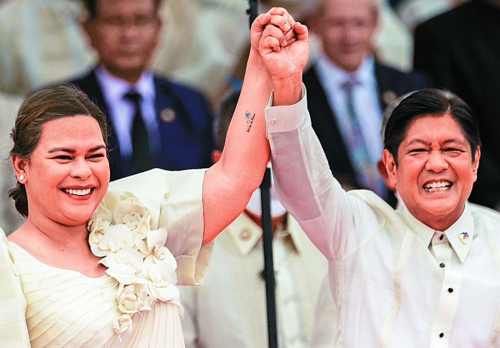 Sara Duterte with Ferdinand Marcos Jr at their inauguration in June 2022. REUTERS Sara Duterte with Ferdinand Marcos Jr at their inauguration in June 2022. REUTERS