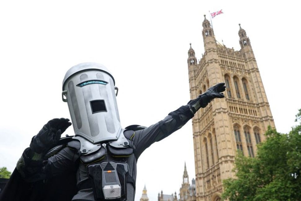 Satirical political character 'Count Binface' poses during an interview with Reuters, ahead of challenging UK Prime Minister Rishi Sunak for the parliamentary seat of Richmond and Northallerton, in the upcoming general election on July 4, outside of the Houses of Parliament in London, Britain, July 2, 2024. REUTERS/Toby Melville Satirical political character 'Count Binface' poses during an interview with Reuters, ahead of challenging UK Prime Minister Rishi Sunak for the parliamentary seat of Richmond and Northallerton, in the upcoming general election on July 4, outside of the Houses of Parliament in London, Britain, July 2, 2024. REUTERS/Toby Melville