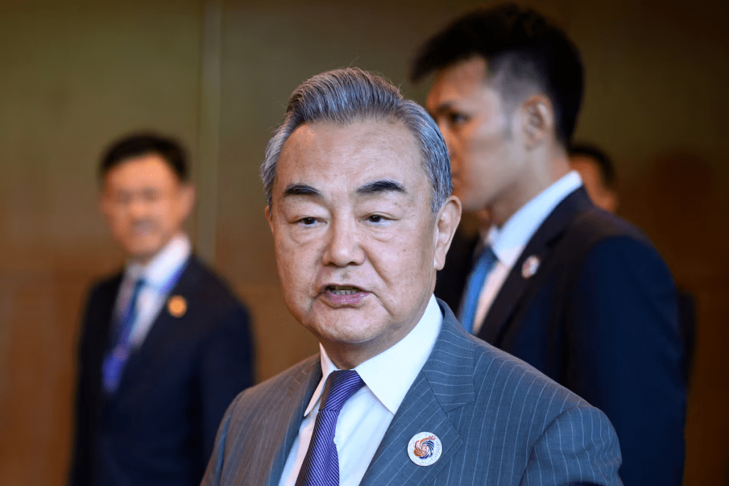 China's Foreign Minister Wang Yi speaks to the media as he walks between meetings during the 58th ASEAN Foreign Ministers meeting and related meetings at the Convention Centre in Kuala Lumpur on July 11, 2025. MANDEL NGAN/Pool via REUTERS/File Photo