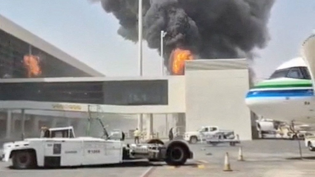 Smoke and flames rise from King Khalid Airport, after Yemen's Iran-backed Houthis said they attacked the airport. Reuters