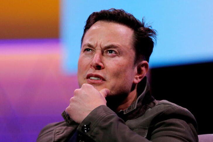 Elon Musk gestures during a conversation. (Reuters) Elon Musk gestures during a conversation. (Reuters)
