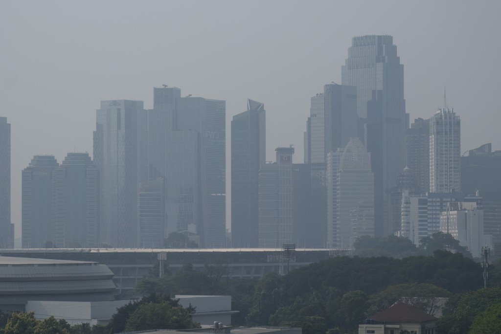 Haze shrouds Jakarta on September 17, 2026. (Photo by BAY ISMOYO / AFP)