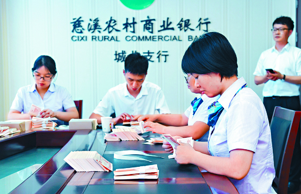 Rural lenders are under pressure. Xinhua Rural lenders are under pressure. Xinhua