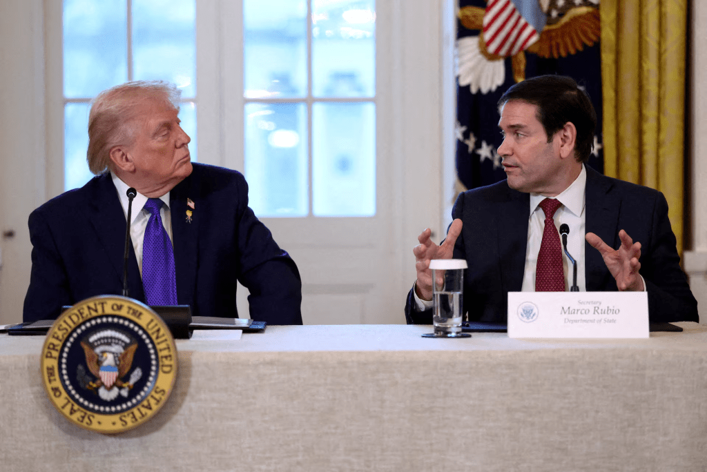 U.S. President Donald Trump and Secretary of State Marco Rubio attend a meeting with oil industry executives, at the White House in Washington, D.C., U.S., January 9, 2026. REUTERS/Kevin Lamarque/File Photo