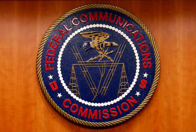 The Federal Communications Commission (FCC) logo is seen before the FCC Net Neutrality hearing in Washington February 26, 2015. The FCC is expected Thursday to approve Chairman Tom Wheeler's proposed "net neutrality" rules, regulating broadband providers more heavily than in the past and restricting their power to control download speeds on the web. REUTERS/Yuri Gripas (UNITED STATES - Tags: POLITICS SCIENCE TECHNOLOGY BUSINESS TELECOMS LOGO)