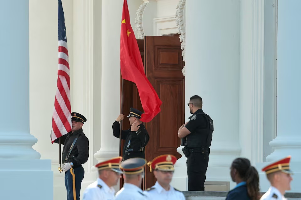 Members of a U.S. military honor guard rehearse an arrival ceremony with a Chinese flag and U.S. flag ahead of Chinese President Xi Jinping’s state visit next week with U.S. President Donald Trump at the White House in Washington, D.C., U.S., September 16, 2026. REUTERS/Jonathan Ernst