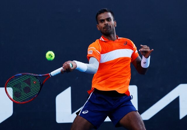 Tennis - Australian Open - Melbourne Park, Melbourne, Australia - January 16, 2024 India's Sumit Nagal in action during his first round match against Kazakhstan's Alexander Bublik REUTERS/Ciro De Luca