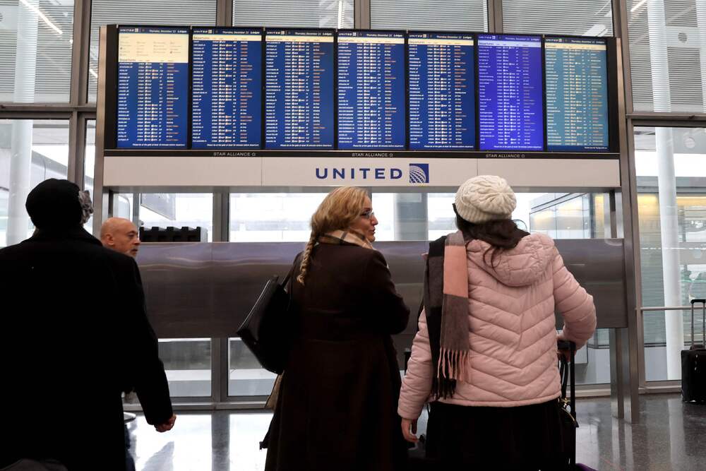 File photo: Travelers check the status of their flights at O'Hare International Airport on December 22, 2022 in Chicago, Illinois. (AFP) File photo: Travelers check the status of their flights at O'Hare International Airport on December 22, 2022 in Chicago, Illinois. (AFP)