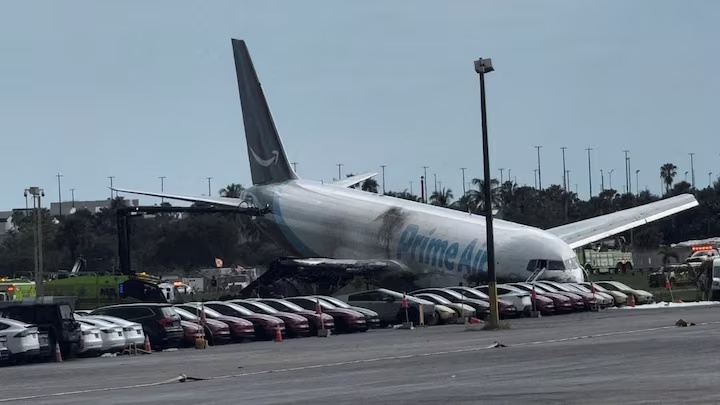 A view of the Amazon Prime Air cargo plane that airport officials said overran a runway at Miami, Florida, U.S., September 6, 2026, in this screengrab from a social media video. Rohan Ellis/via REUTERS