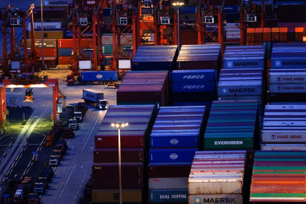 A truck carrying containers moves at Yantian port in Shenzhen, Guangdong province, China May 9, 2025. (Reuters)