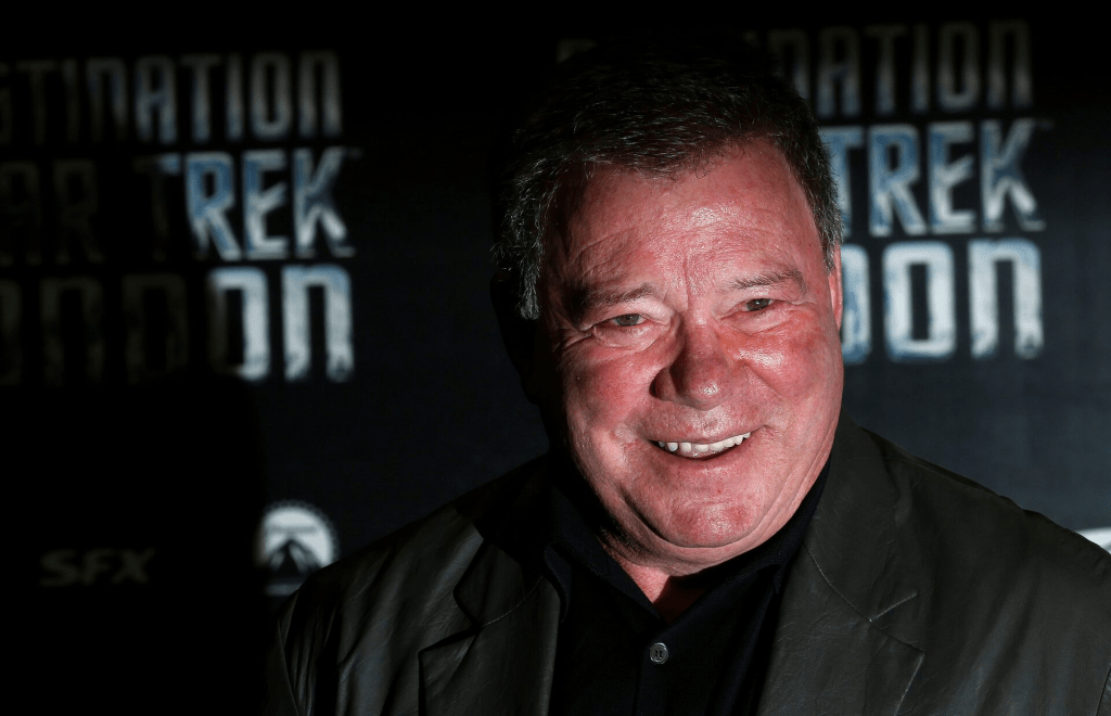 William Shatner who plays Captain James T. Kirk in the original version of Star Trek arrives at the Destination Star Trek London event October 19, 2012. REUTERS/Suzanne Plunkett/File Photo 