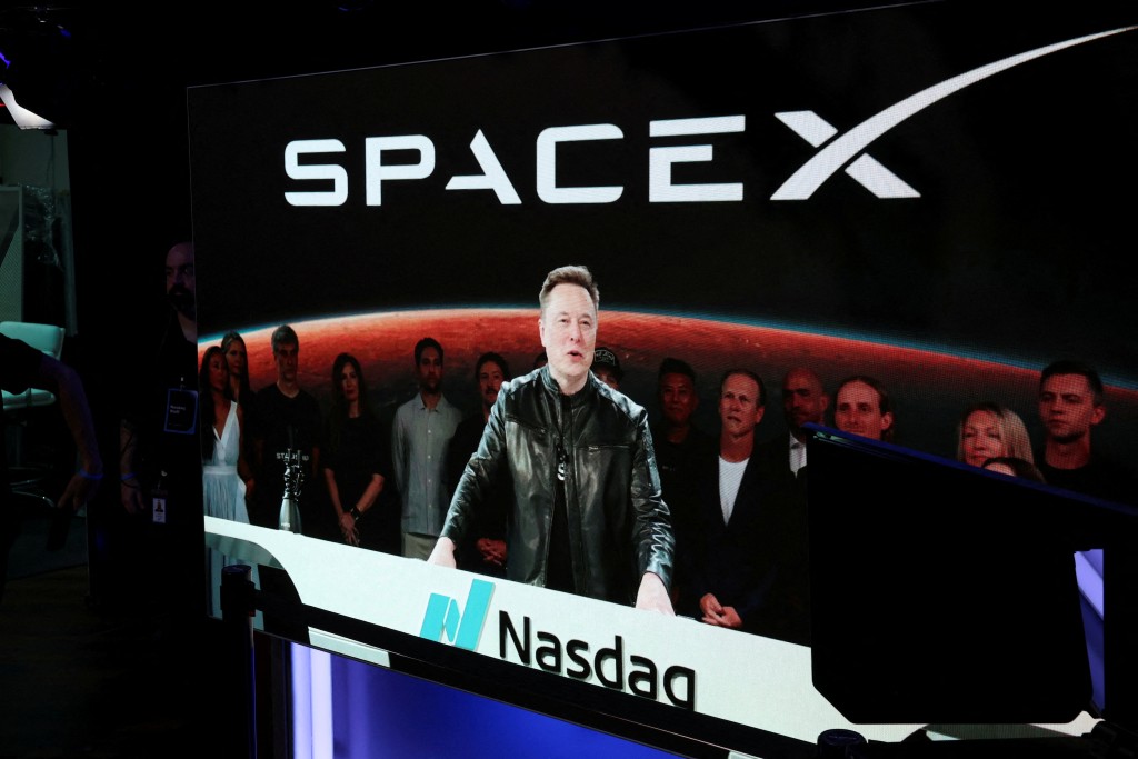 Founder, CEO, Chairman and Chief Engineer of SpaceX, Elon Musk, speaks via videolink on the day of SpaceX's initial public offering (IPO) at the Nasdaq MarketSite in New York City, U.S., June 12, 2026. REUTERS